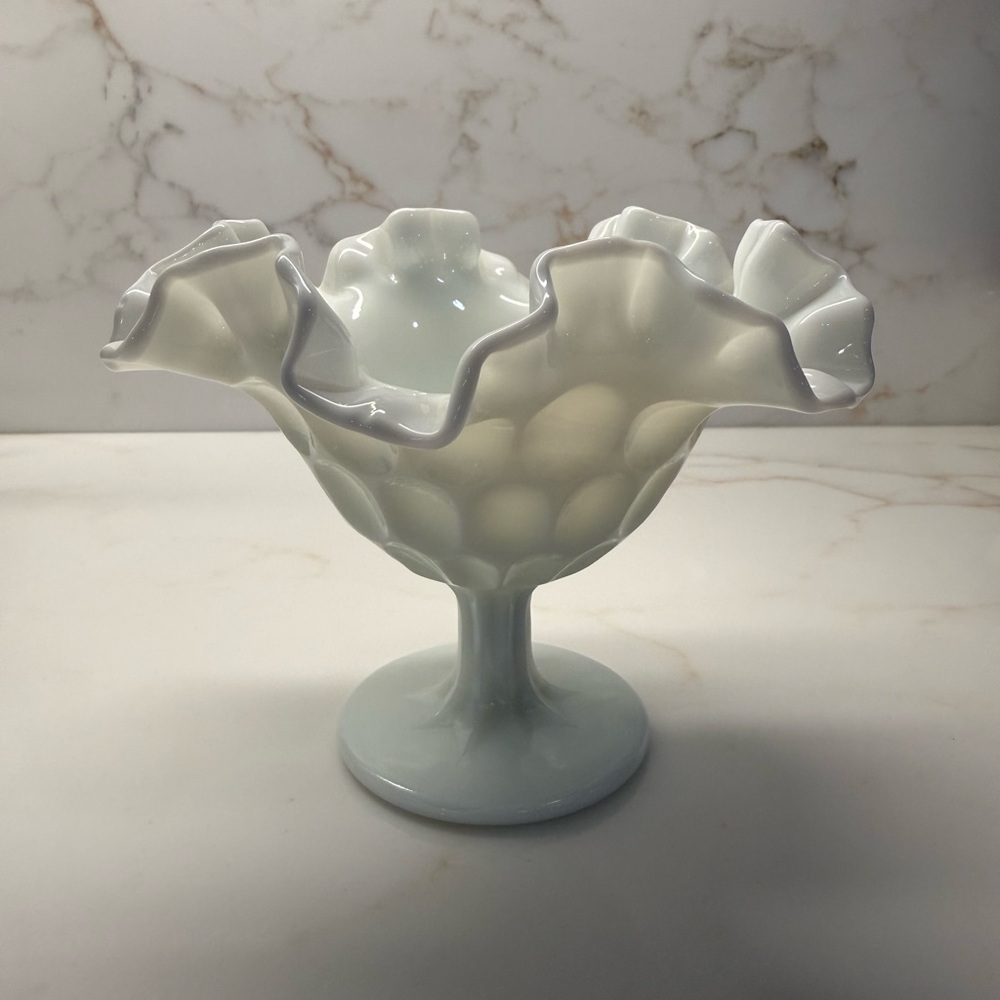 Fenton thumbprint milk glass compote.